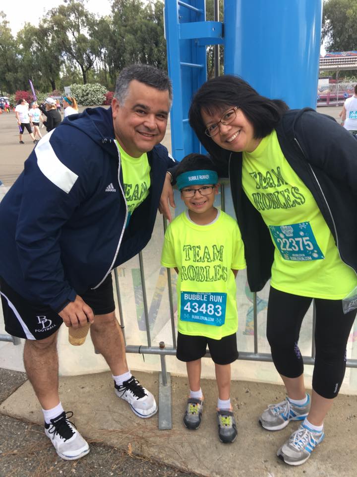 Mike Robles with son, Ivan, and wife, Linda.